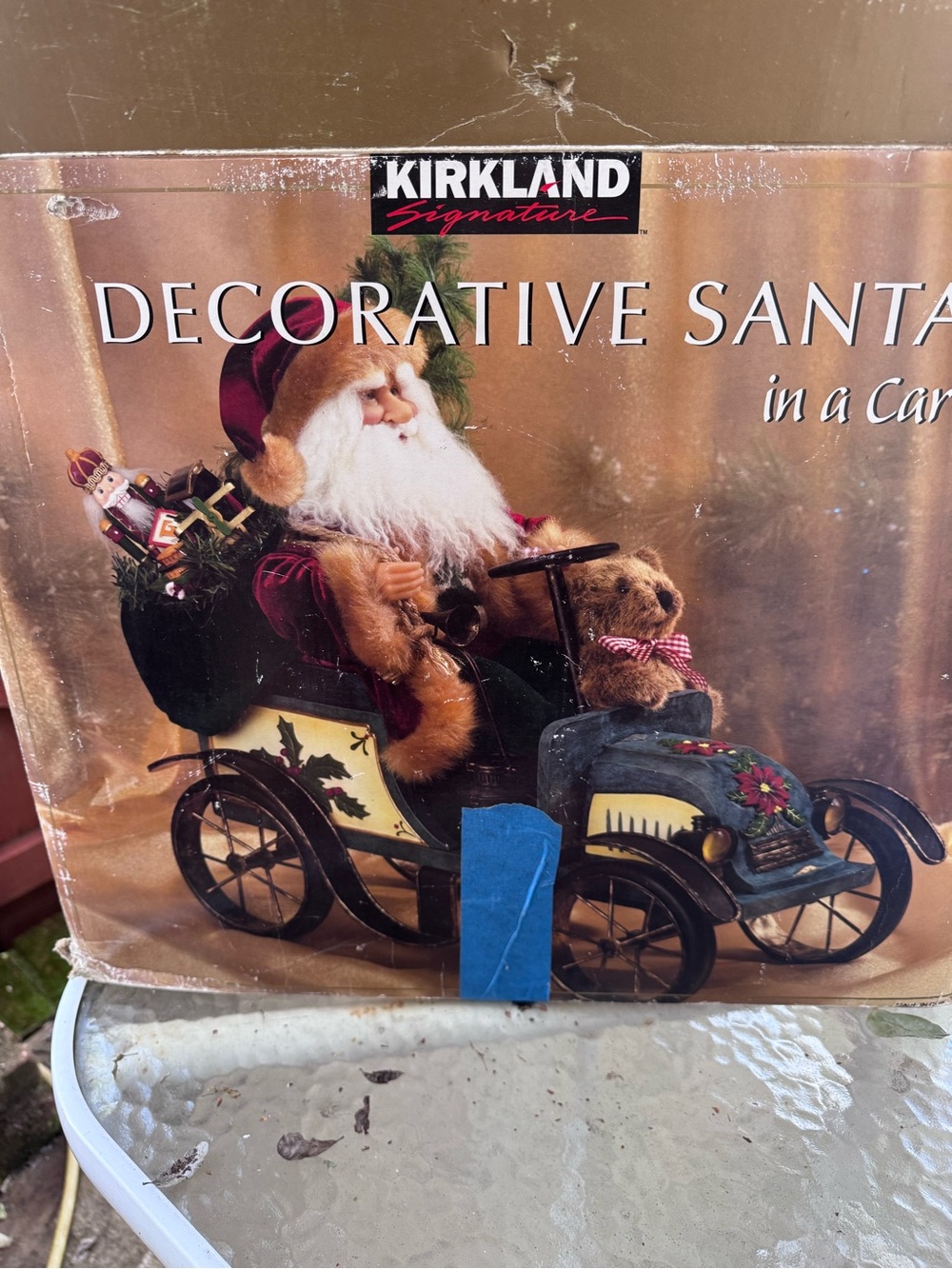 Kirkland Signature Santa in Vintage Green Car with Red Trim